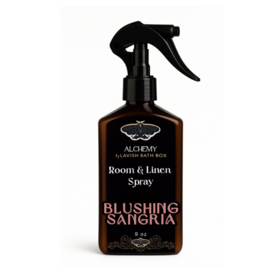 Room and linen spray bottle labeled 'Blushing Sangria' on a white background