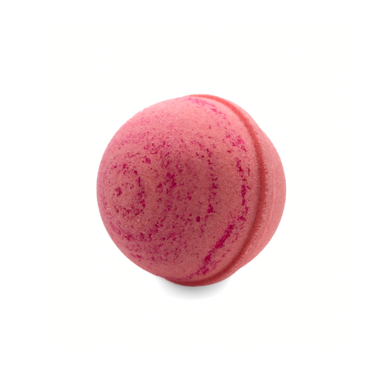 Pink bath bomb on a white background